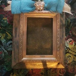 Picture frame and a key holder